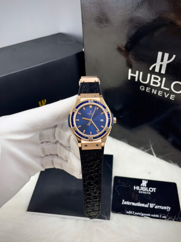 Đồng hồ Hublot Classic Fusion nữ king gold đính đá baguette xanh fake 11 34mm