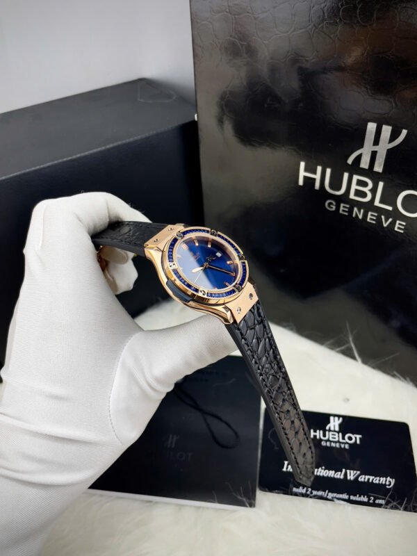 Đồng hồ Hublot Classic Fusion nữ king gold đính đá baguette xanh fake 11 34mm