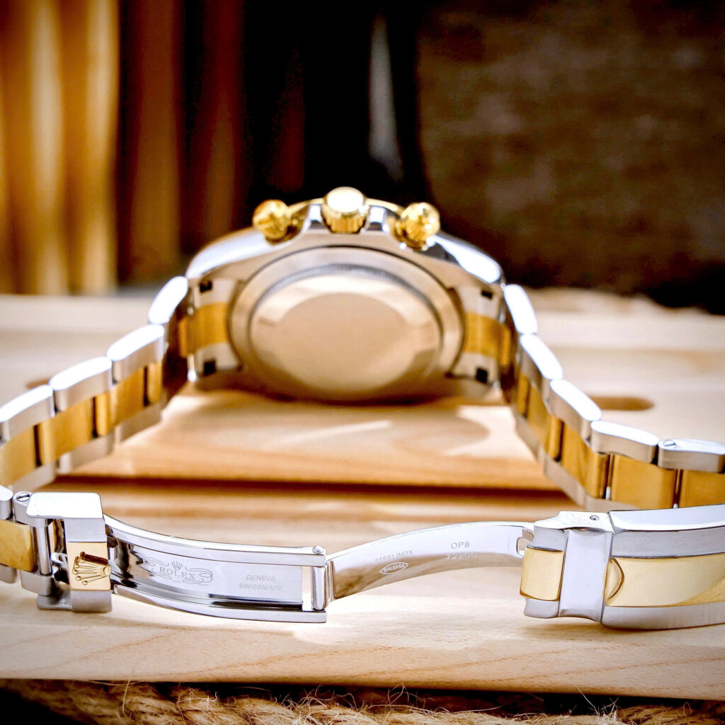 Đồng hồ Rolex Daytona Cosmograph demi vàng cọc dạ quang fake 11 40mm
