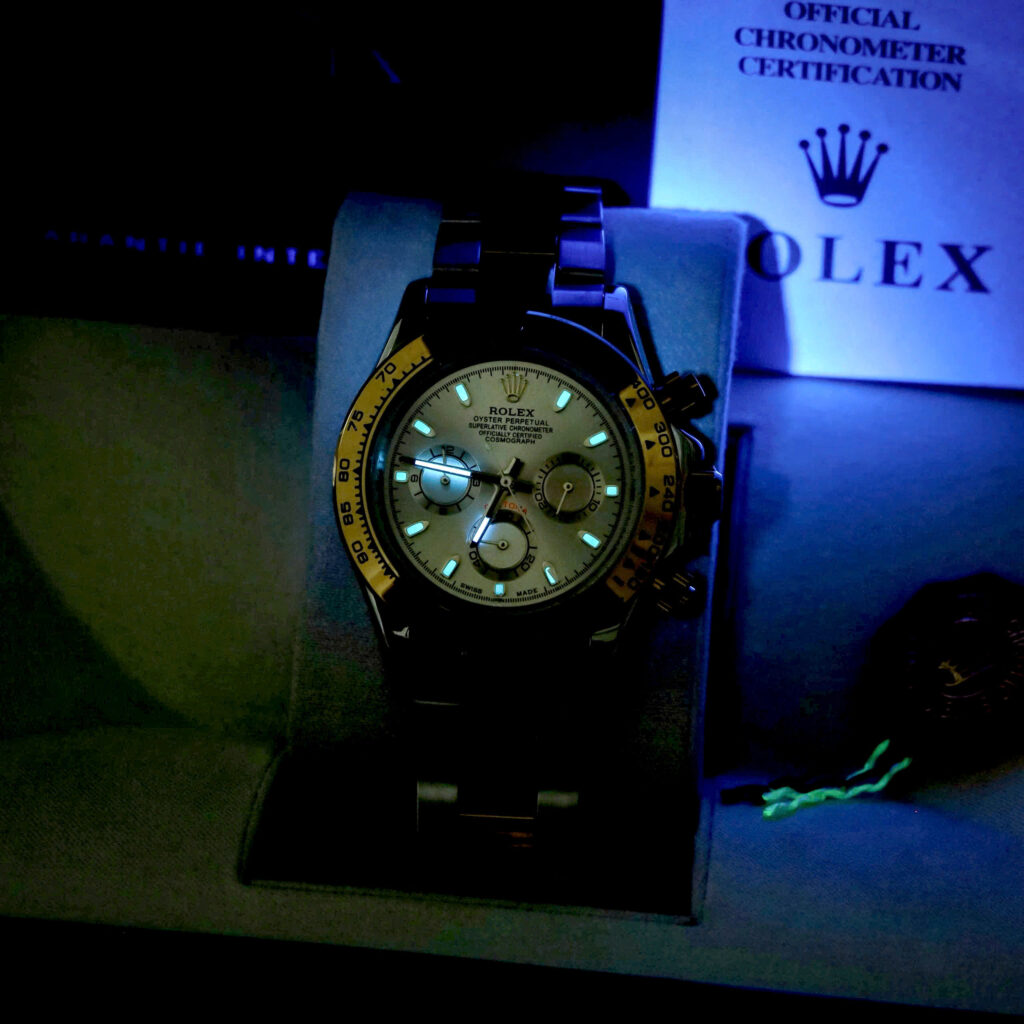 Đồng hồ Rolex Daytona Cosmograph demi vàng cọc dạ quang fake 11 40mm