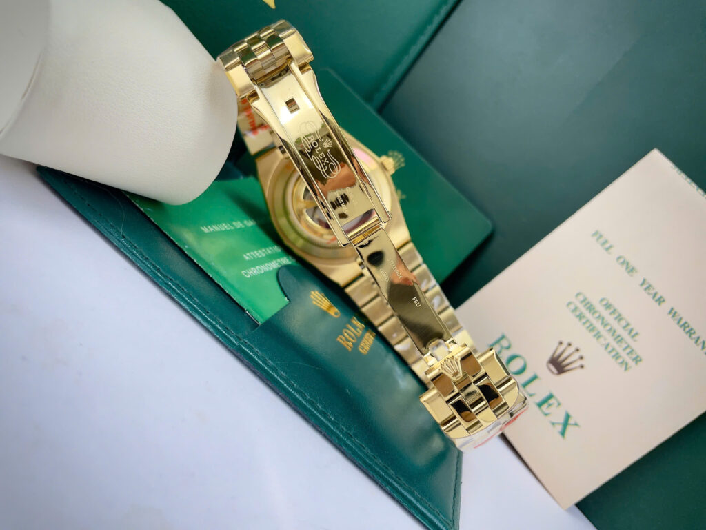 Đồng hồ Rolex Land-Dweller vàng gold mặt đen fake cao cấp 40mm