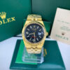 Đồng hồ Rolex Land-Dweller vàng gold mặt đen fake cao cấp 40mm