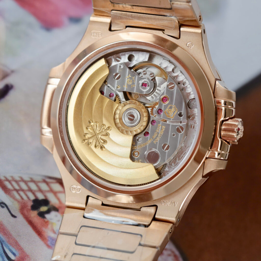Đồng hồ nữ Patek Philippe Nautilus 7118 Replica 11 mạ vàng hồng viền đính đá nhà máy GR 35 (2)