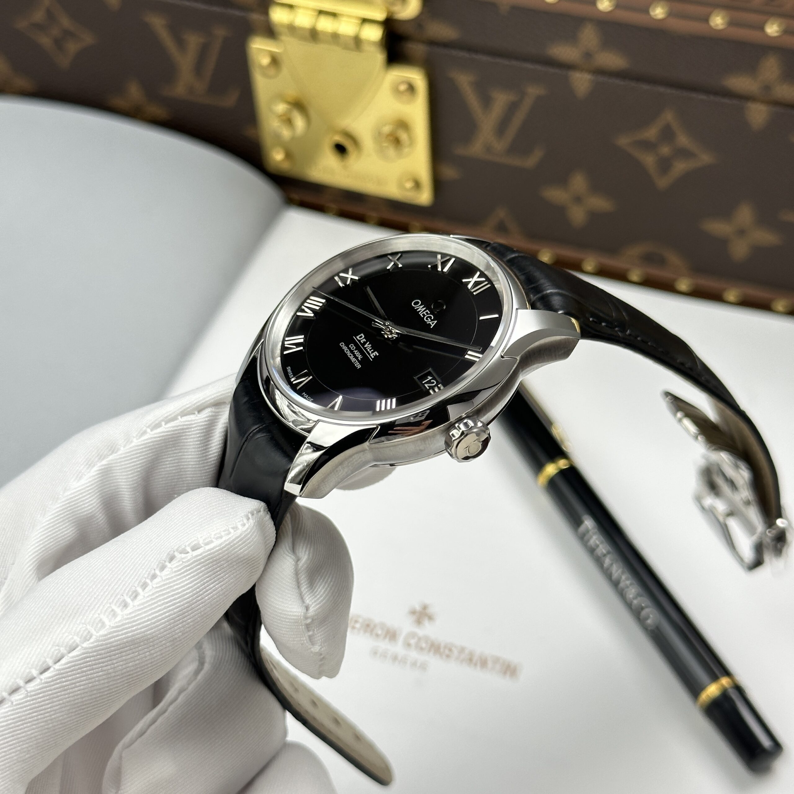 Đồng hồ Omega Replica 1 1 De Ville Co-Axial Chronometer 8500 mặt đen dây da 41mm (10) Đồng hồ Omega Replica 1 1 De Ville Co-Axial Chronometer 8500 mặt đen dây da 41mm (2)