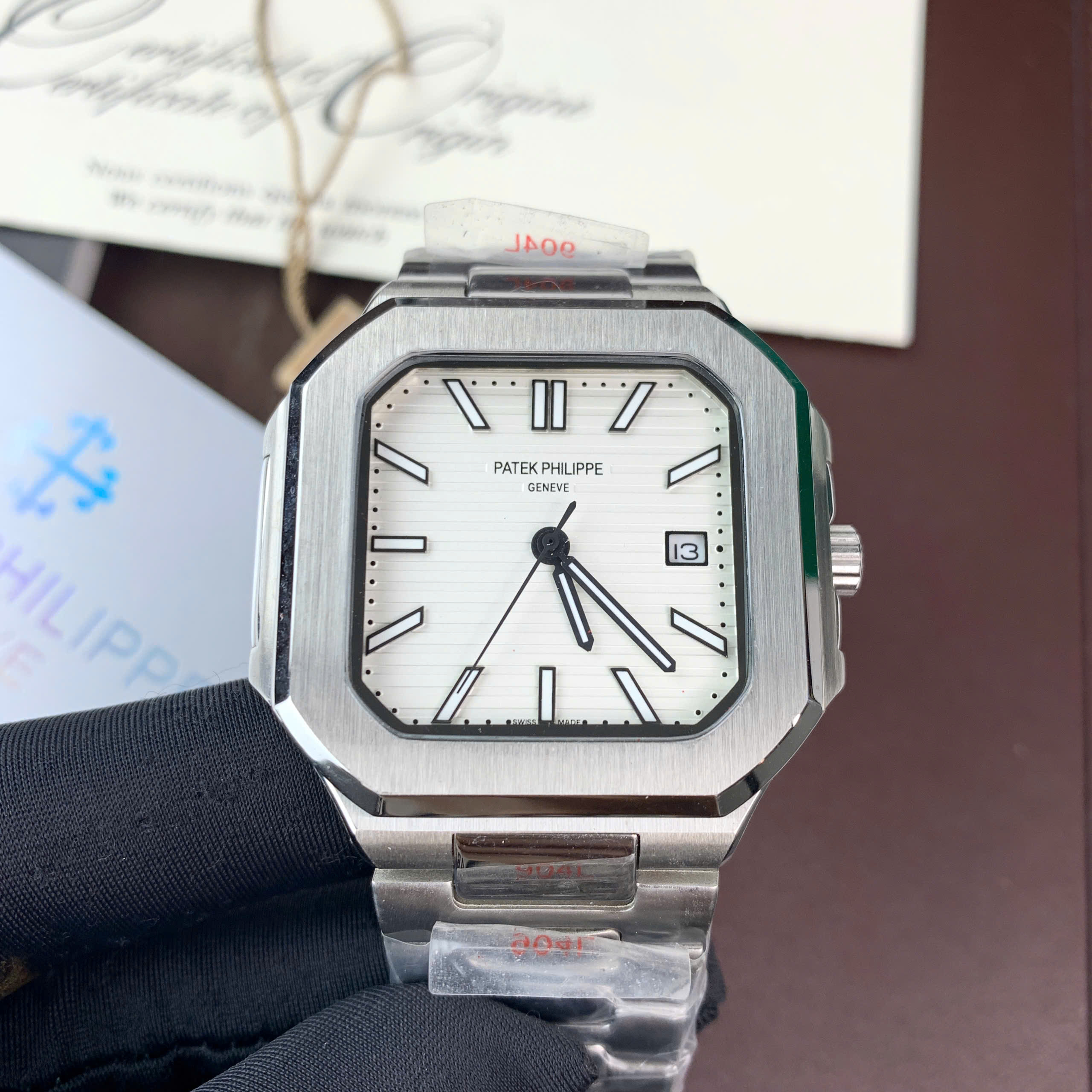 Đồng hồ Patek Philippe Cubitus nam mặt trắng máy cơ nhật giá rẻ fake 11 45mm (10) Đồng hồ Patek Philippe Cubitus nam mặt trắng máy cơ nhật giá rẻ fake 11 45mm