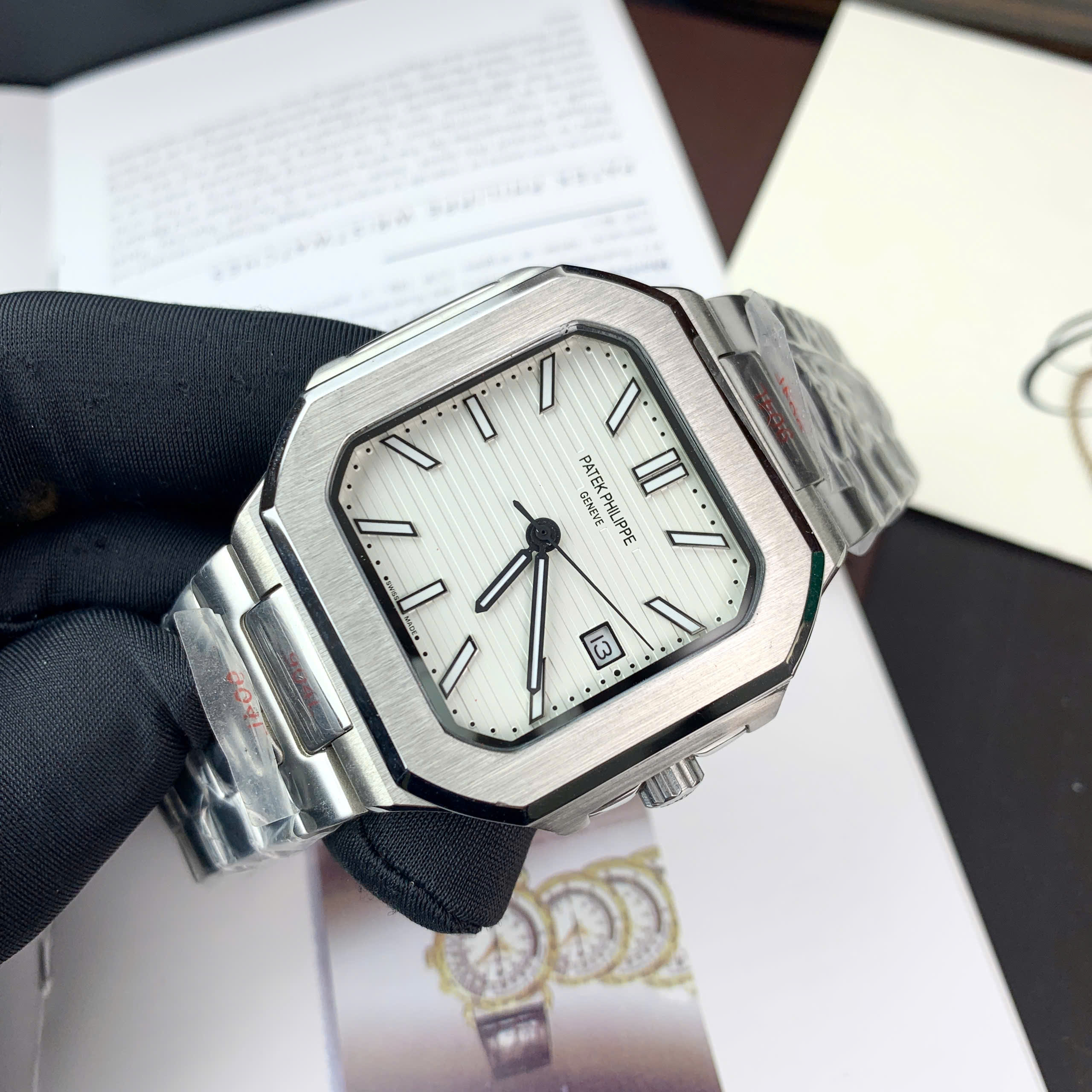 Đồng hồ Patek Philippe Cubitus nam mặt trắng máy cơ nhật giá rẻ fake 11 45mm (6) Đồng hồ Patek Philippe Cubitus nam mặt trắng máy cơ nhật giá rẻ fake 11 45mm